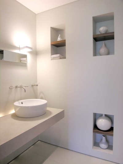 Chicago apartment, modern powder room, limestone slab benchtop, wall niche, Stark Design